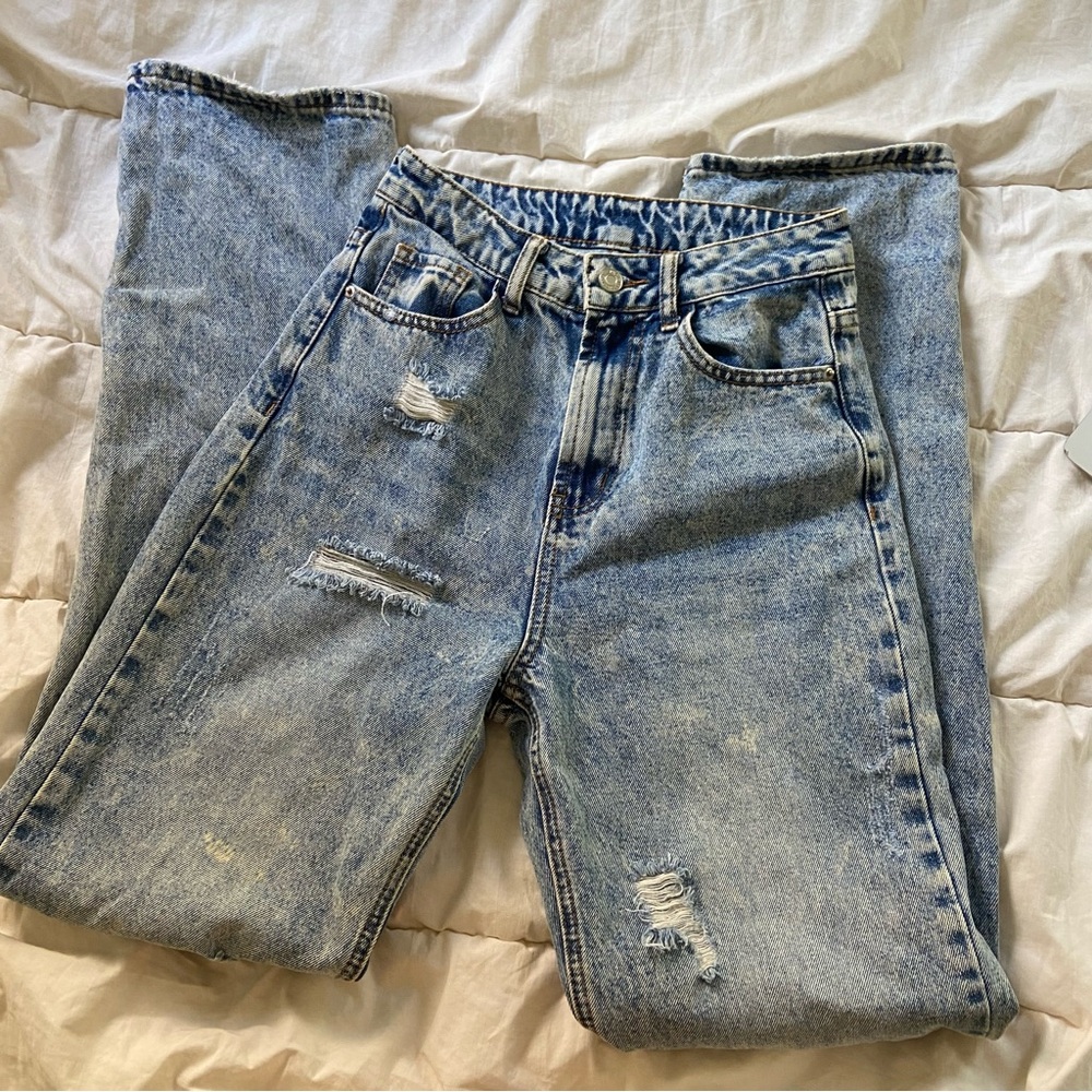 blue ripped straight leg jeans